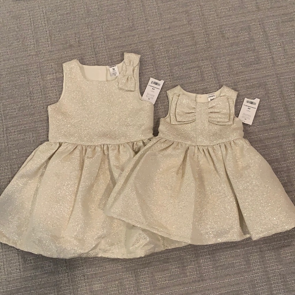 Girls matching sparkle dresses! 👯